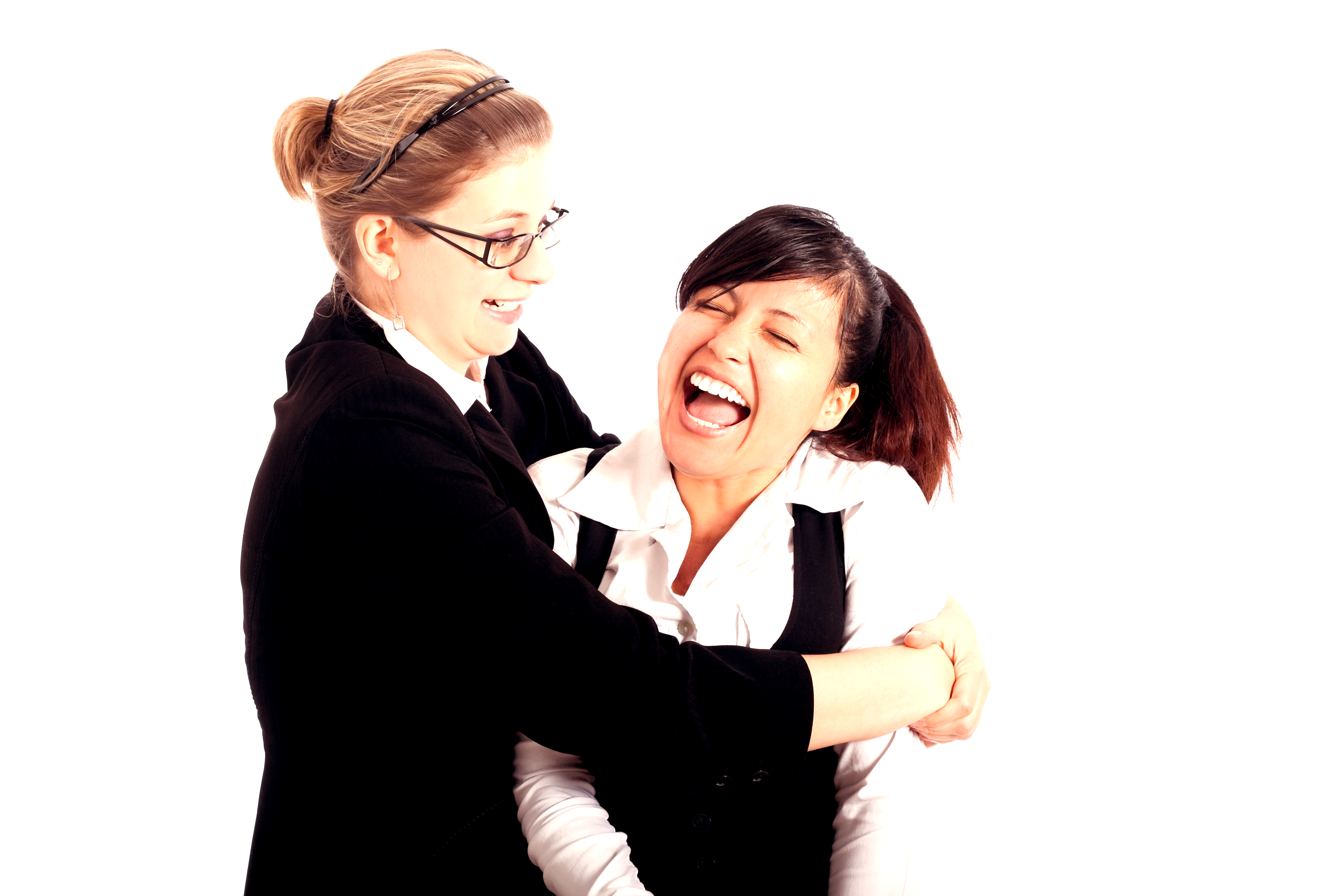 Two young happy business women funny moment, isolated on white background celebrating in the sales Lane