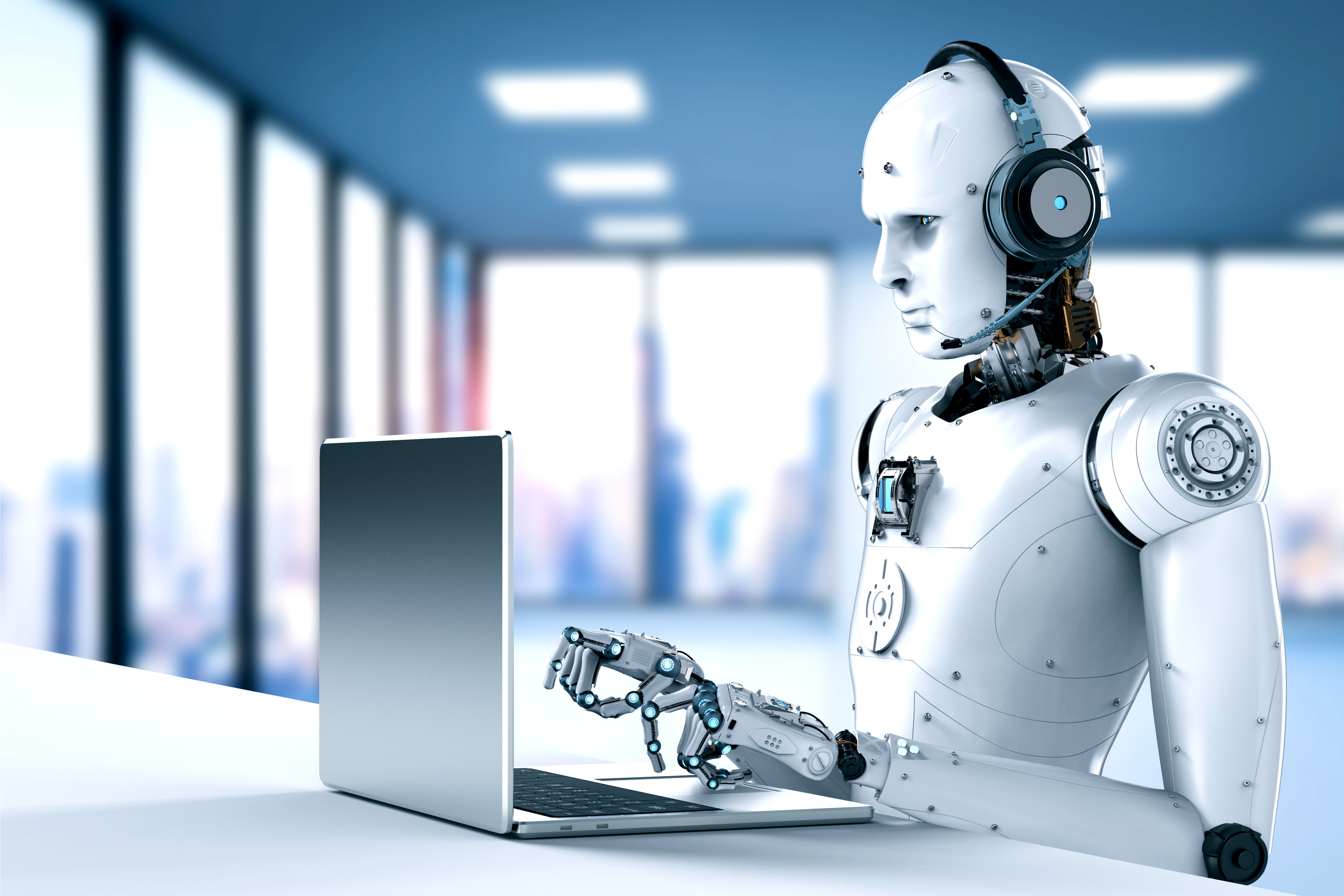 Robot at sales desk working on automated email campaign